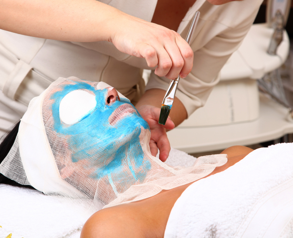 Woman getting a beauty mask at the spa